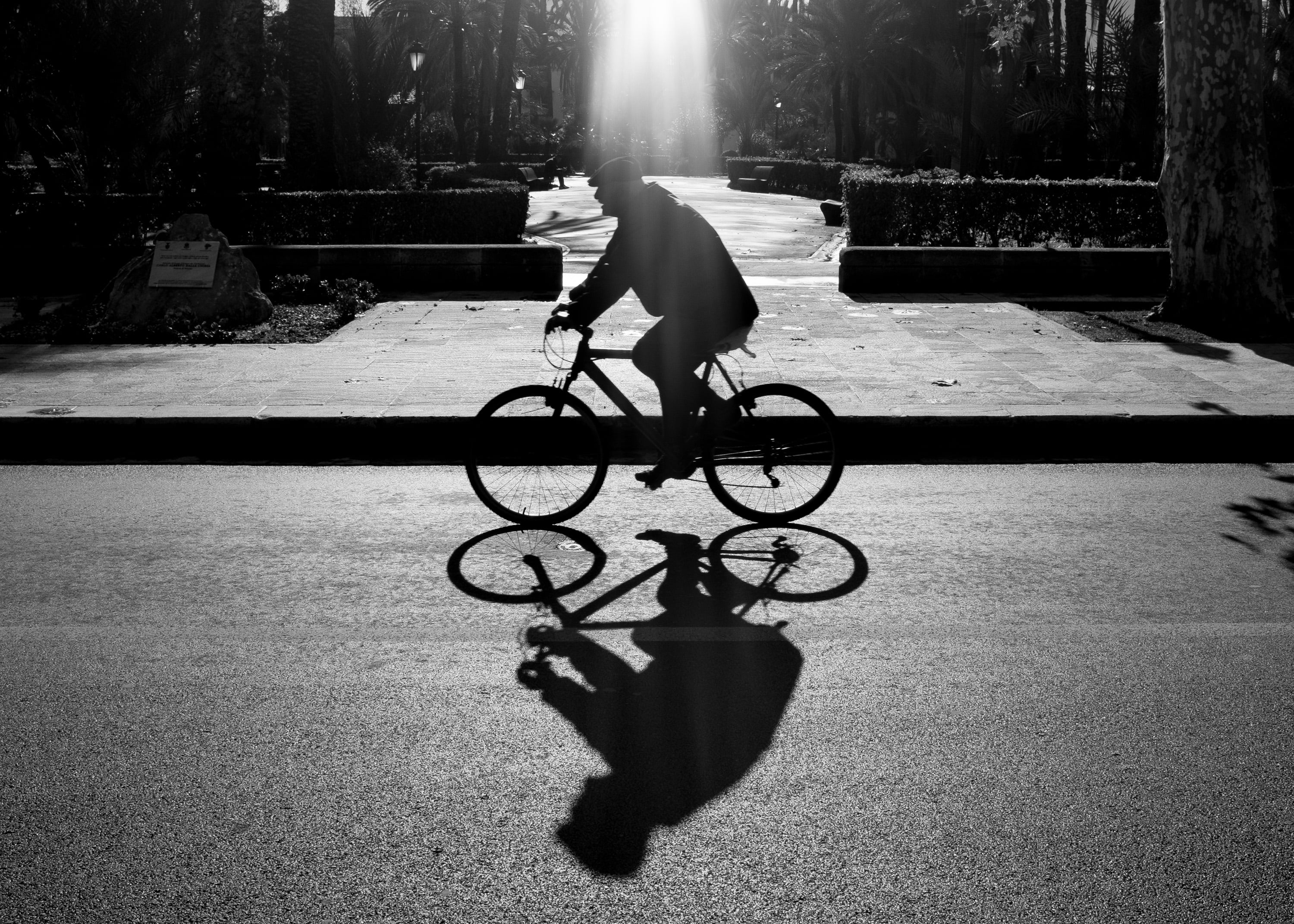 man riding on bicycle during daytime in grayscale photo, Untitled