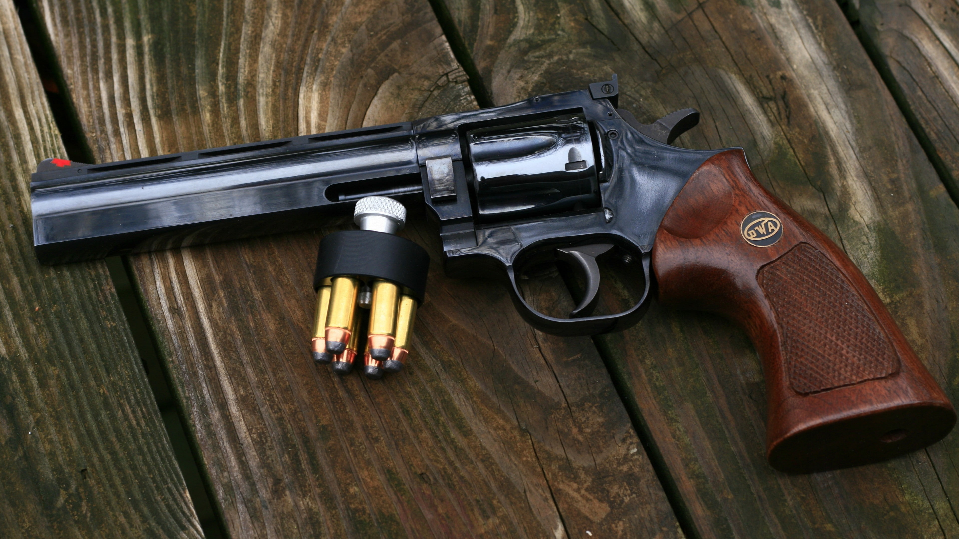 black and brown revolver gun on brown wood planks, Dan Wesson