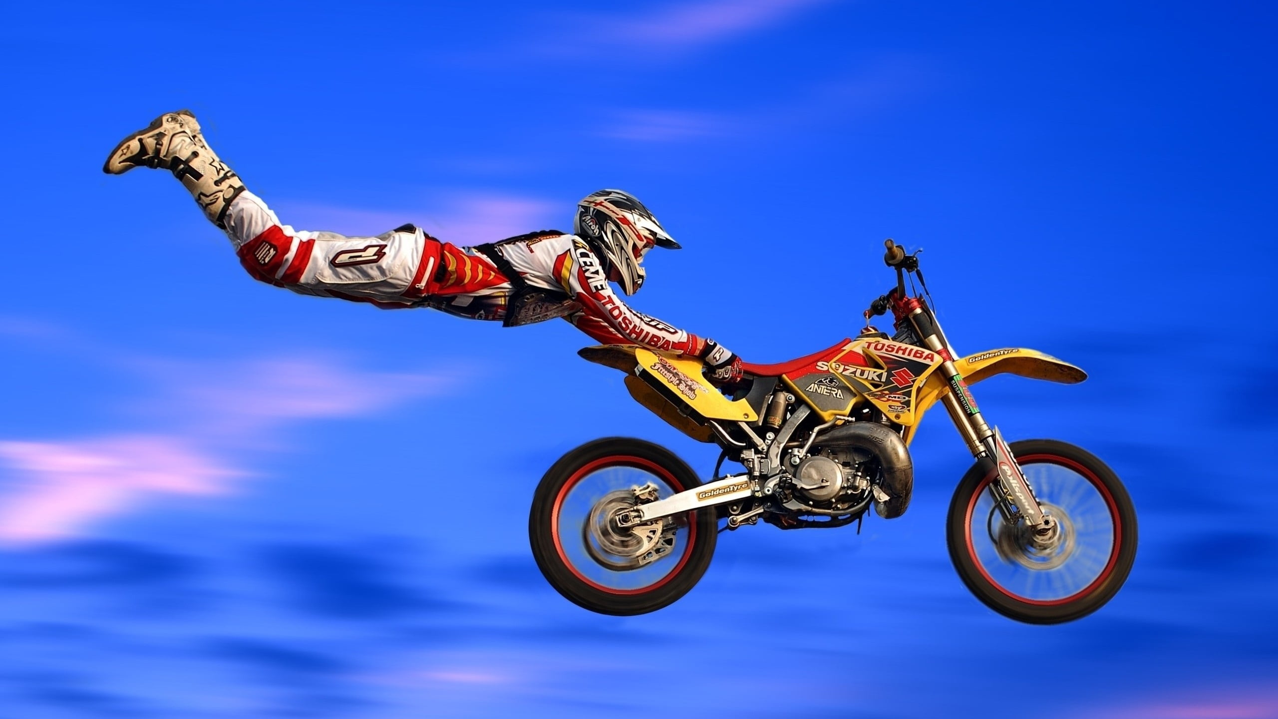 yellow, red, and black dirt bike, motorcycle, flight, trick, jump