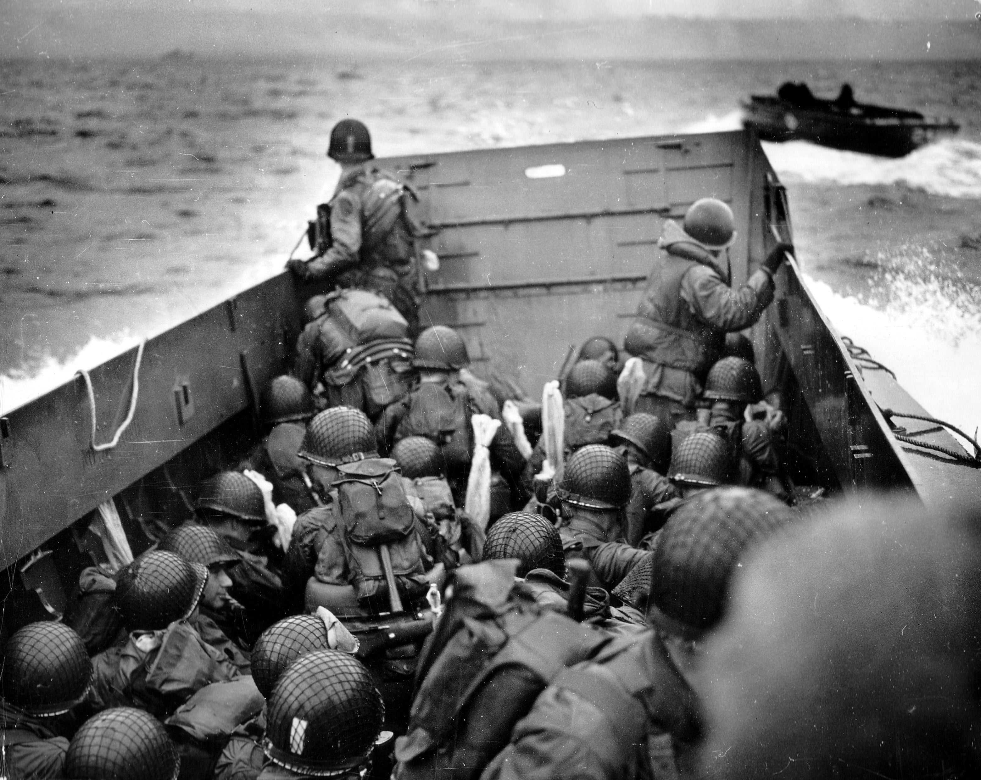 combat helmet lot, military, World War II, Omaha Beach, people