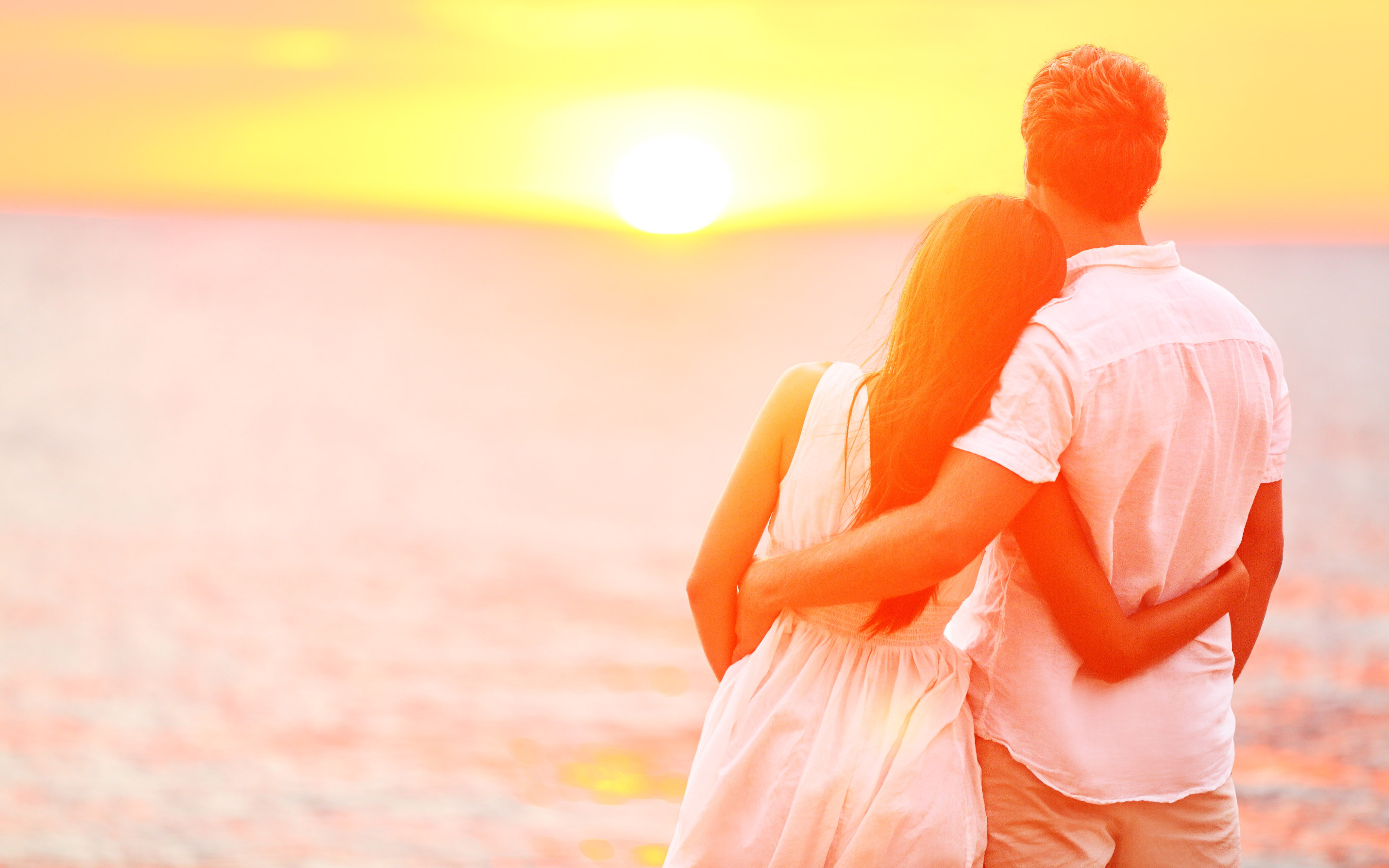 Honeymoon Couple Romantic In Love At Beach Sunset, two people