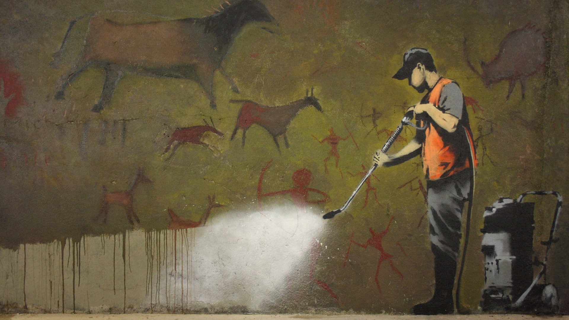 man pressure washing cave paintings graffiti, loss, texture, cleaning