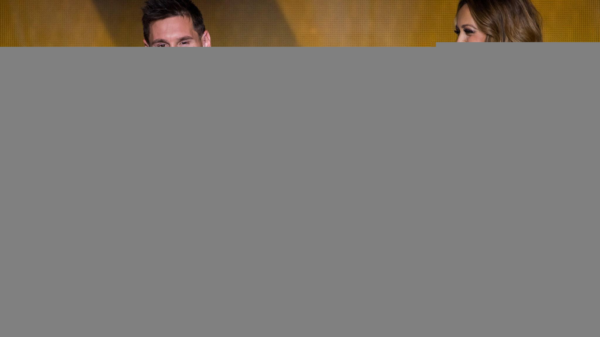 Presenter Kate Abdo (R) speaks with FIFA Ballon d'Or nominee Lionel Messi