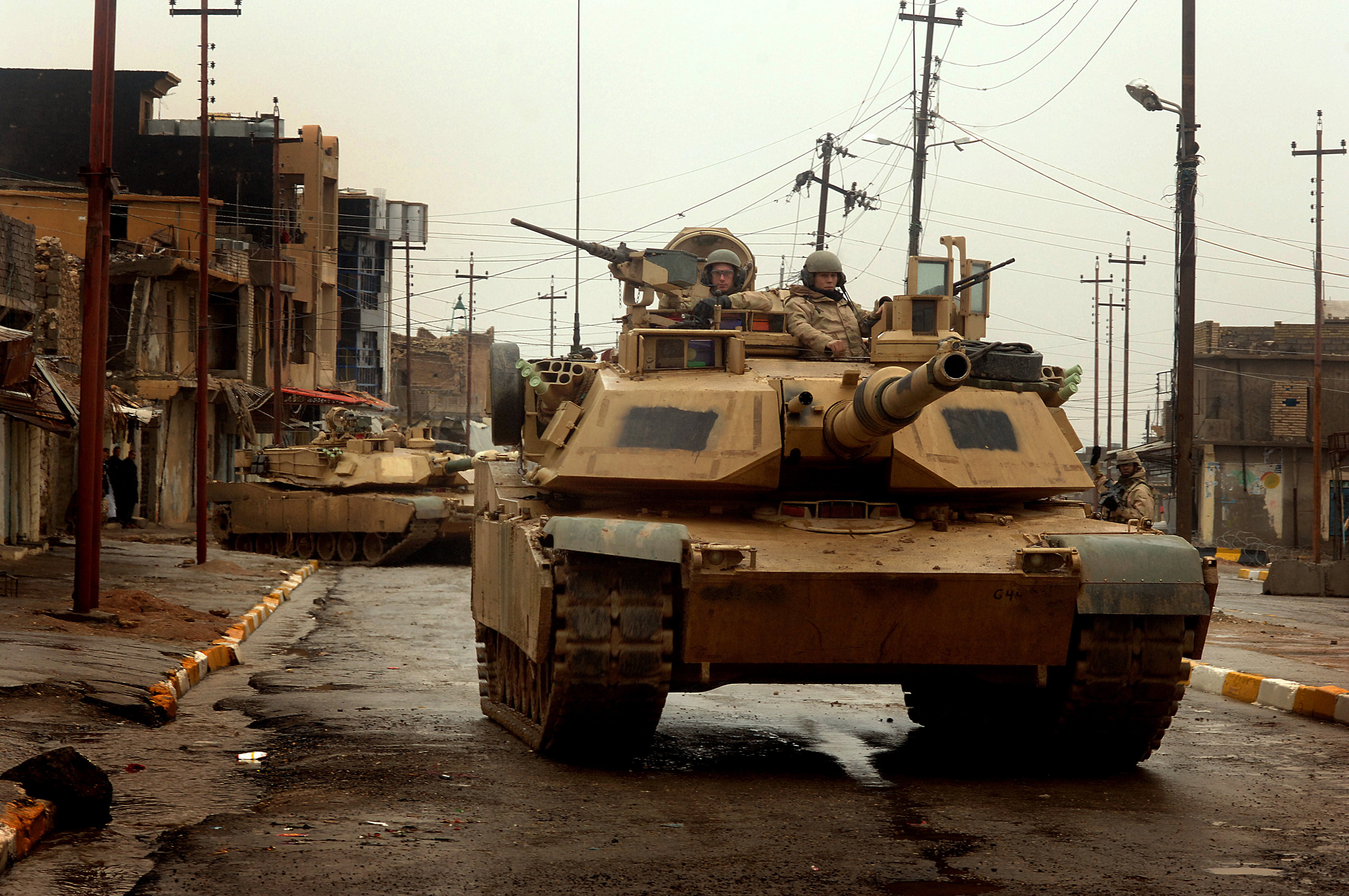 yellow battle tank, Abrams, main battle tank USA, in the city of tall afar