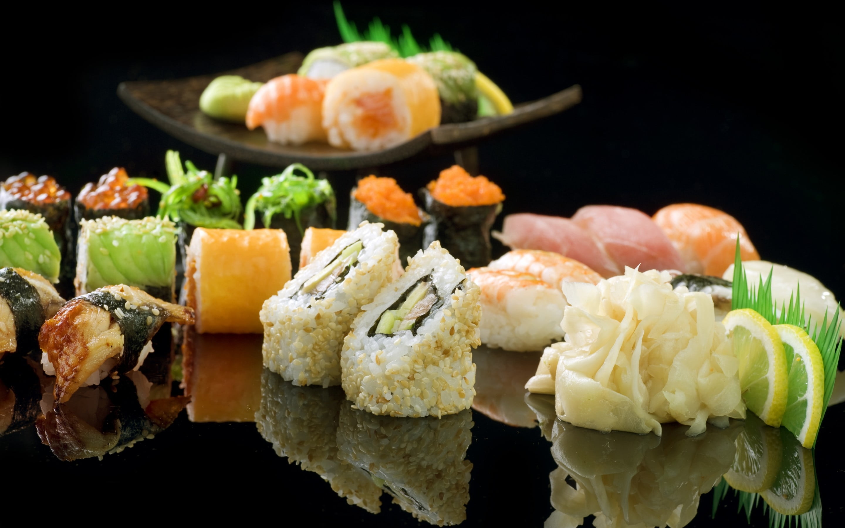 sushi platter, rolls, ginger, shrimp, lemon, fish, eggs, food