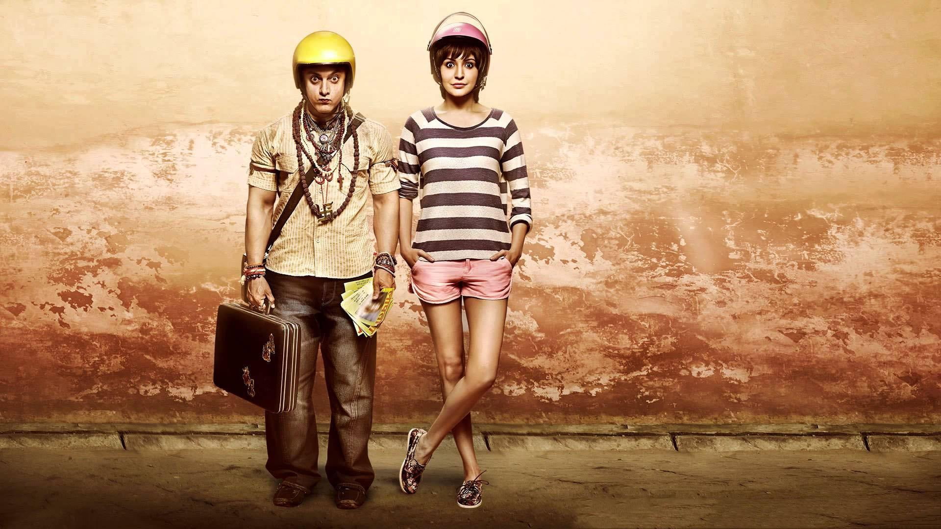 Anushka Sharma Aamir Khan PK Movie, man and woman standing behind the wall picture