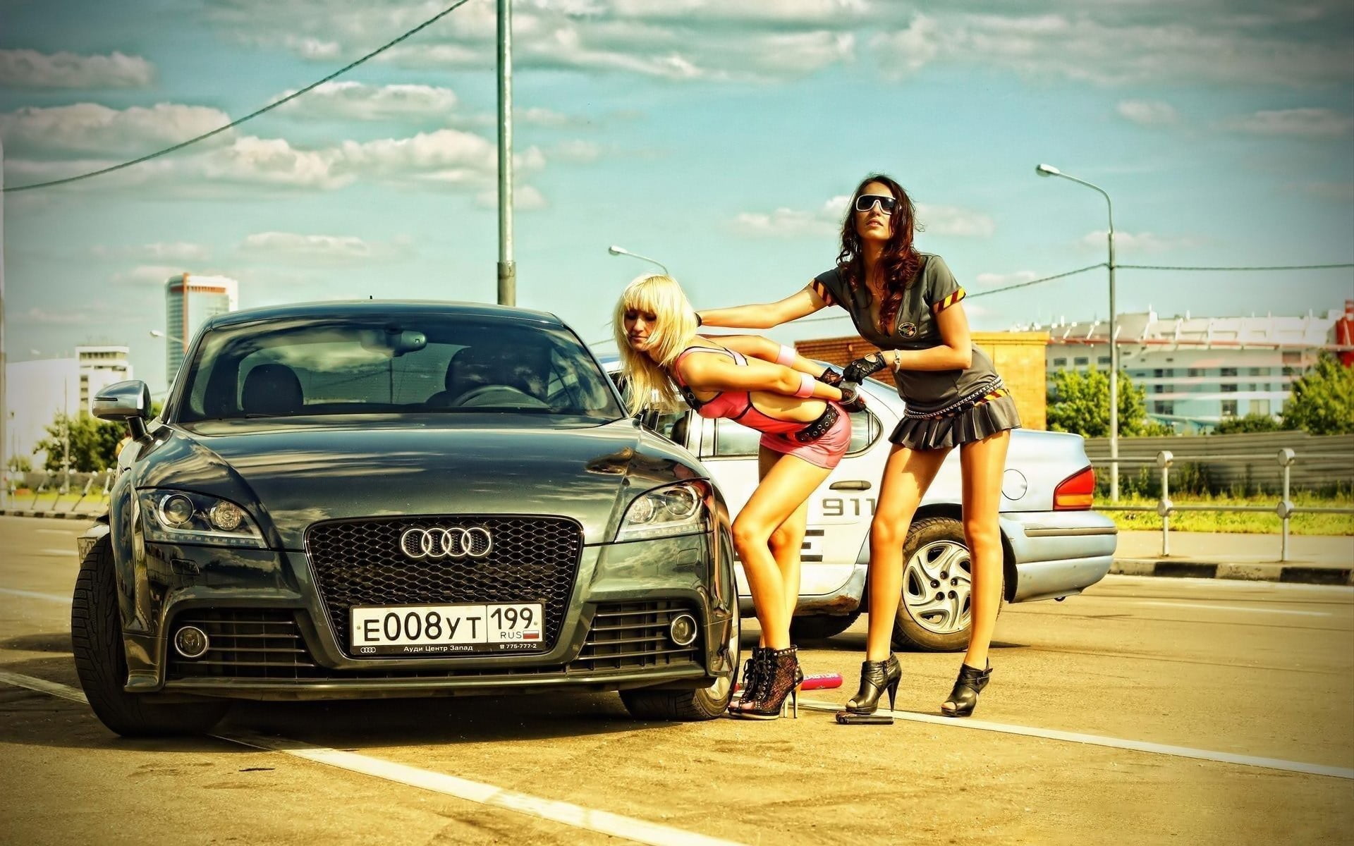 green Audi car, road, the sky, Girls, glasses, Two beautiful girls