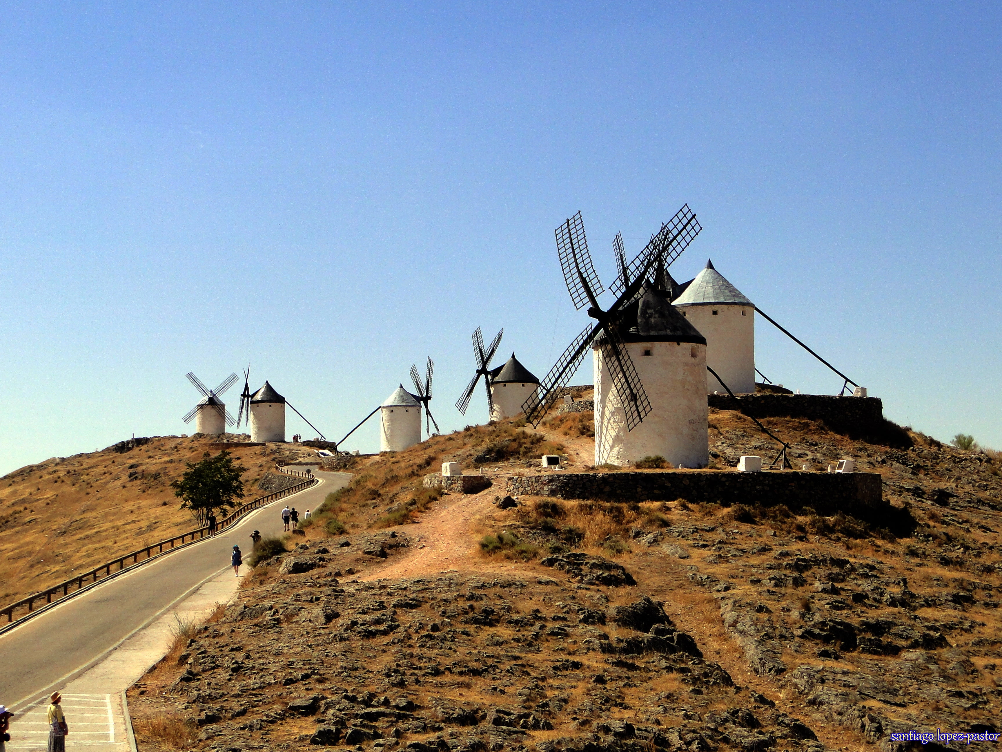 five white concrete windmills during daytime, consuegra, consuegra