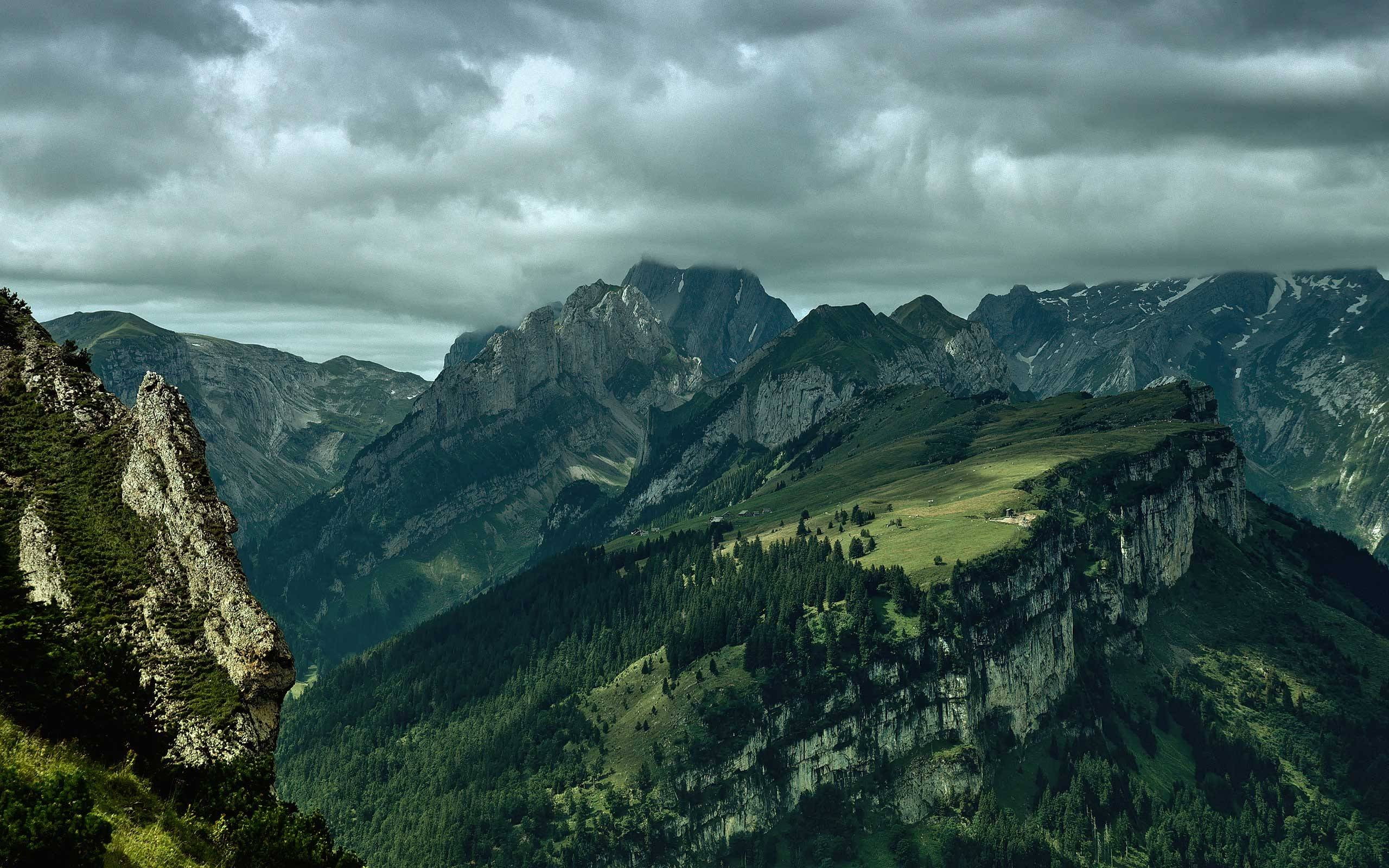 green, black, and gray mountain range, landscape photo of green mountains