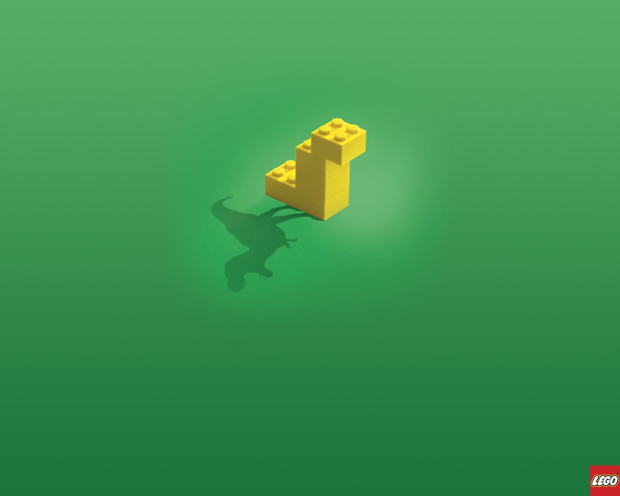 yellow LEGO brick toy, green background, dinosaurs, imagination