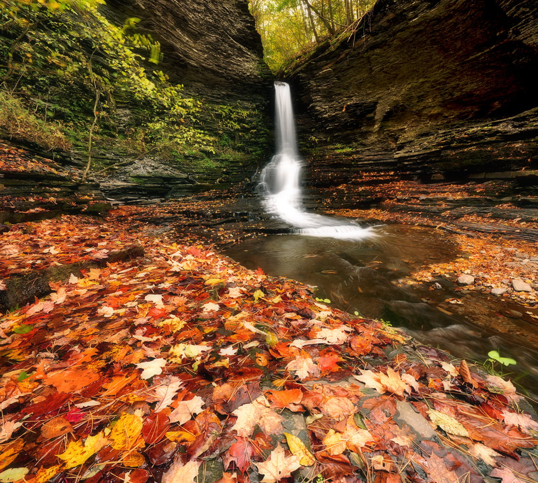 waterfalls between brown rock formation, glen falls, glen falls