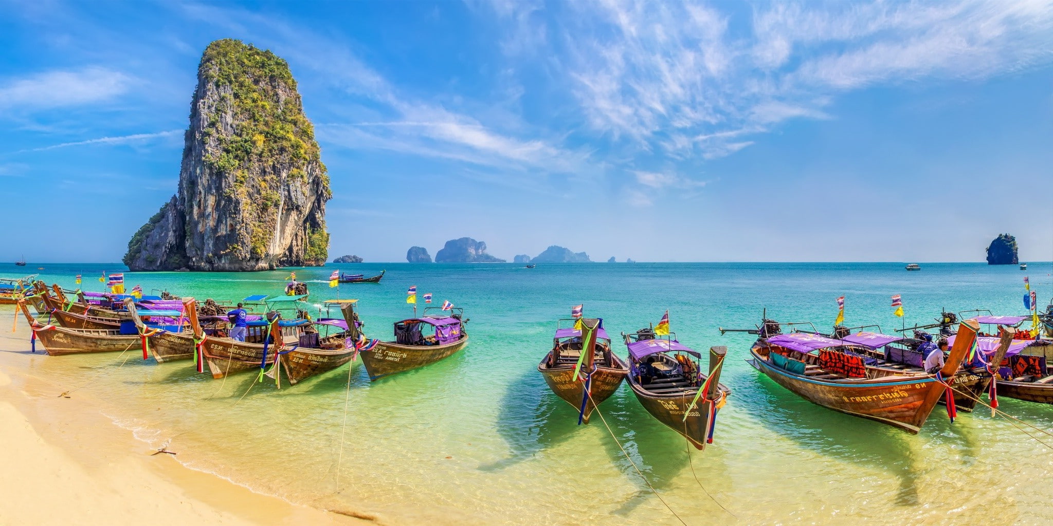 beach sand boat limestone island sea turquoise water tropical vacations summer nature landscape thailand