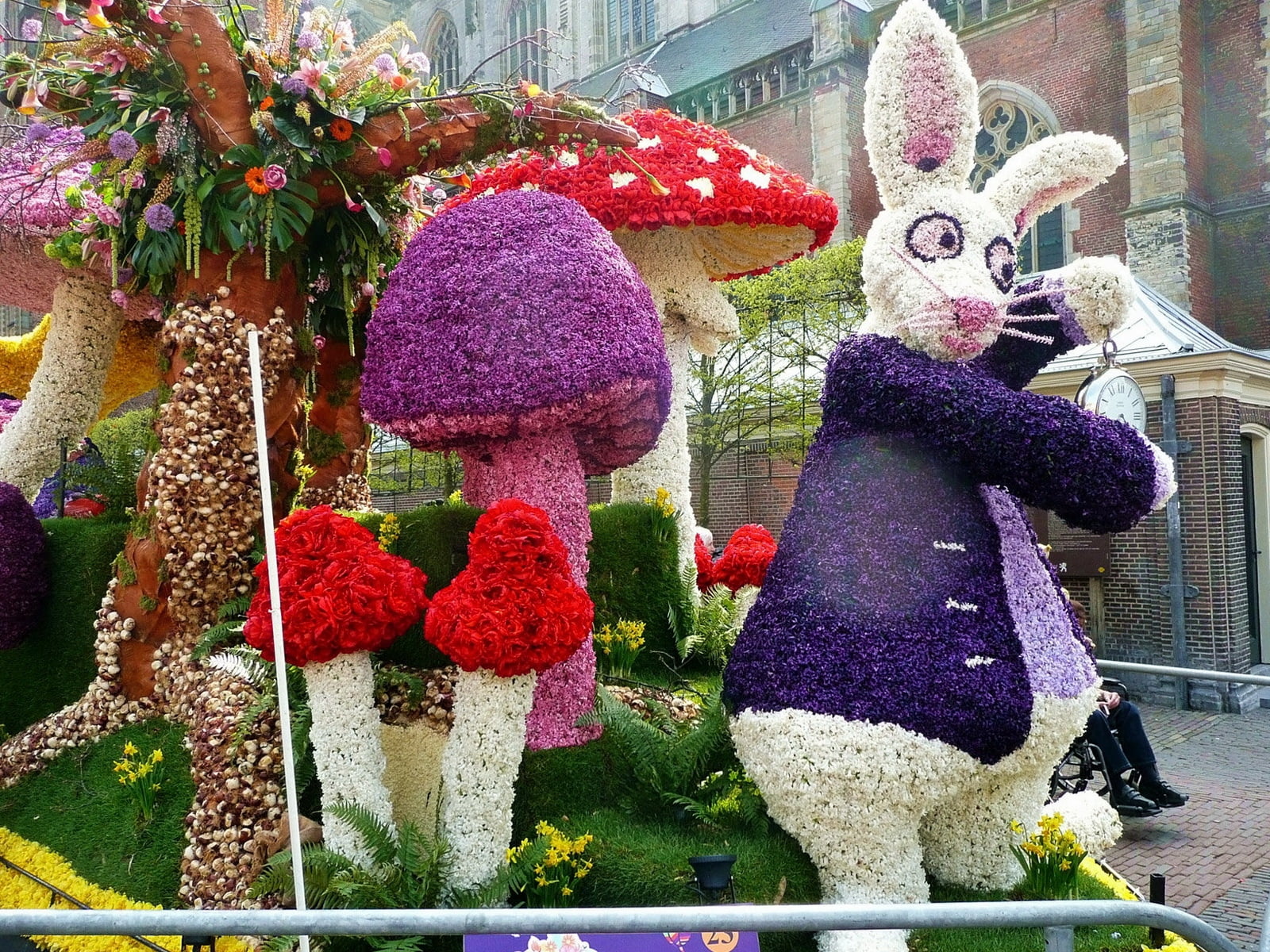 purple and white rabbit topiary decor, flowers, mushrooms, lawn