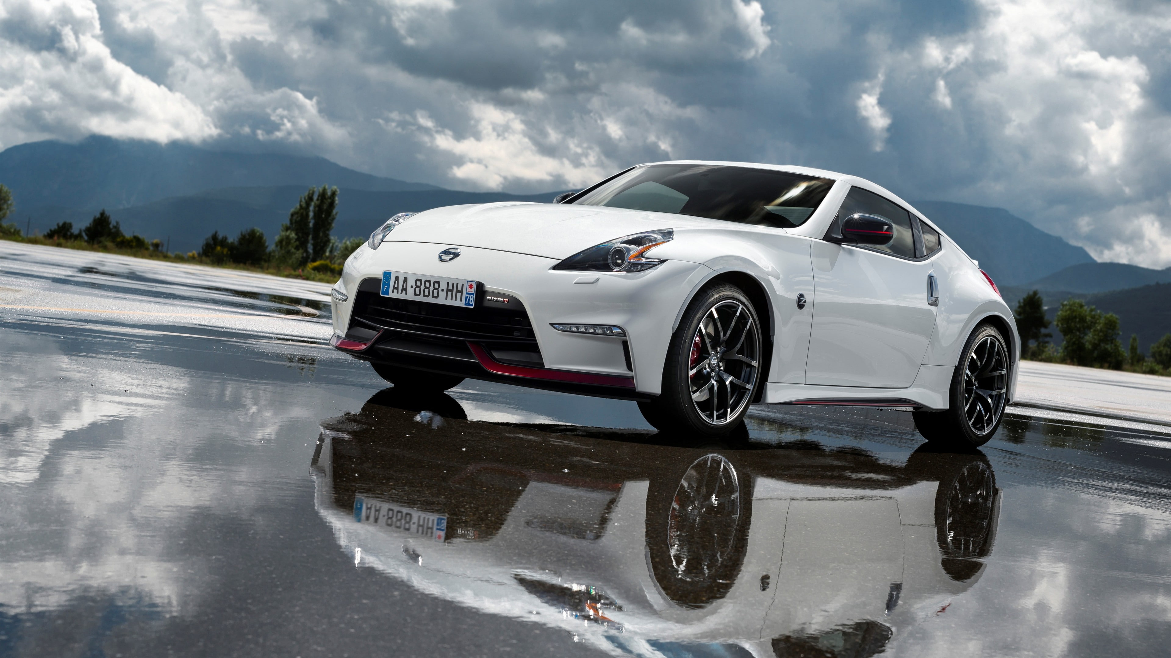 white Nissan coupe on wet road during daytime, Nissan 370Z, NISMO
