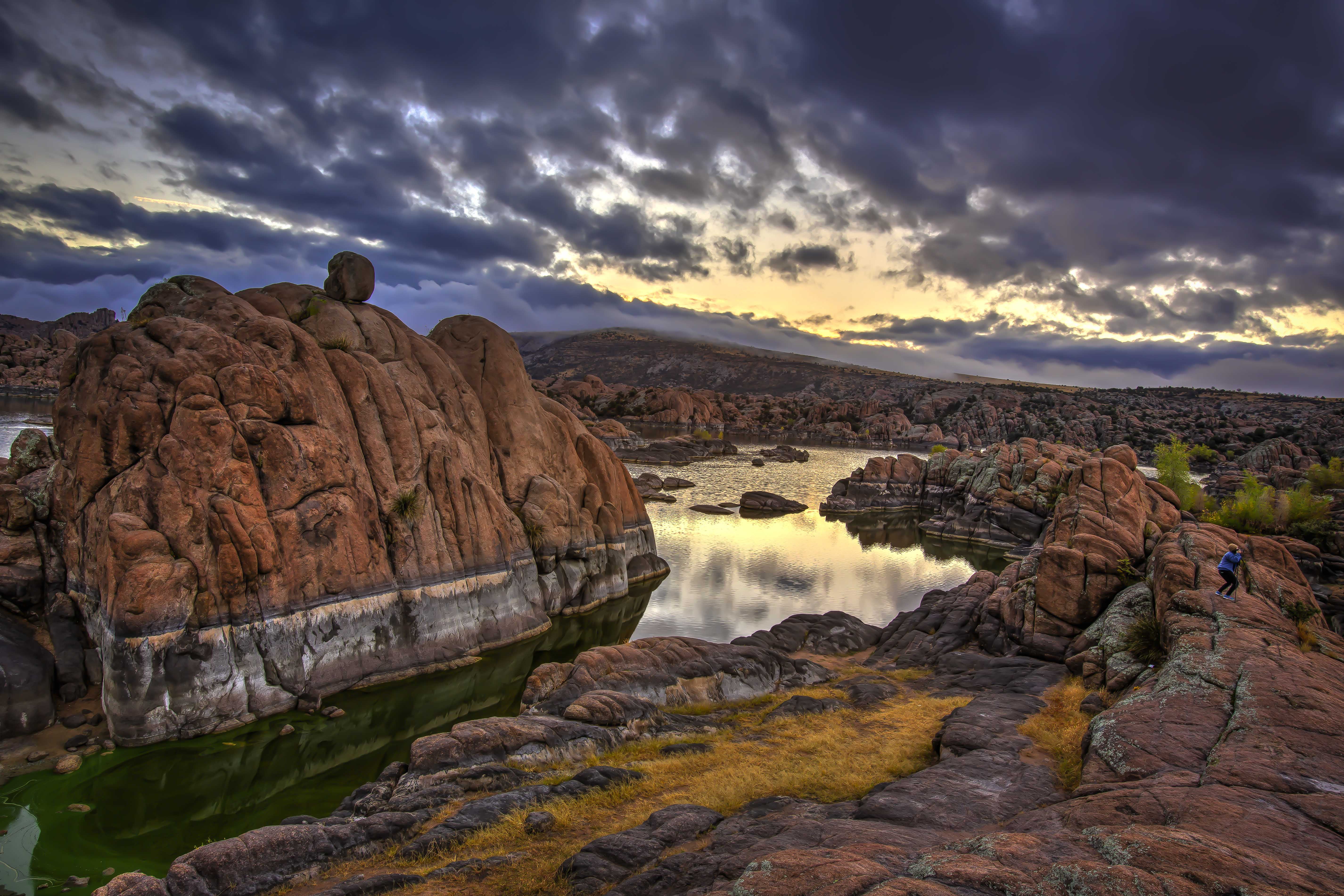 landscape photography of river between brown mountains, Watson Lake