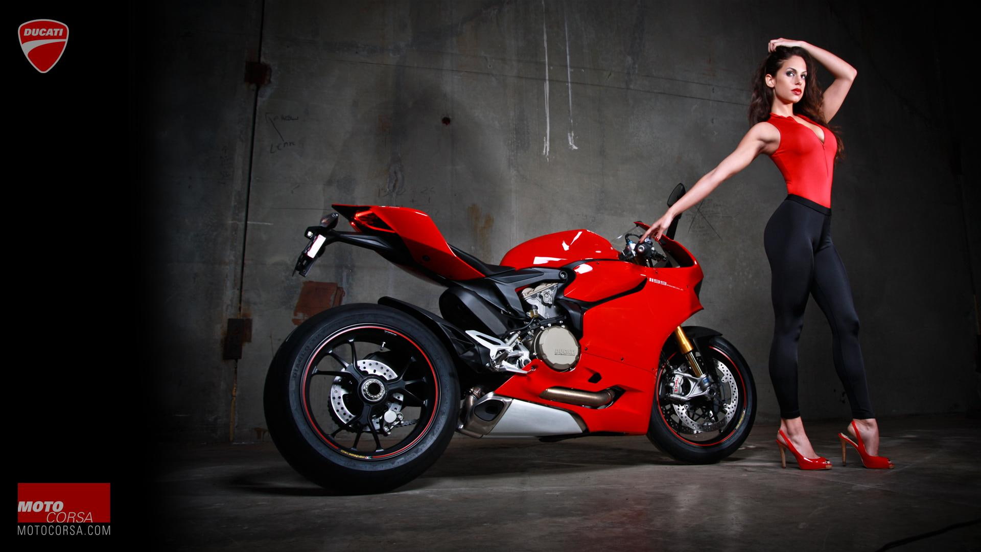 Seductive Ducati 1199 Panigale Photo 12, red and black sport bike; women's red v neck sleeveless shirt, black pants and red stilettos outfit