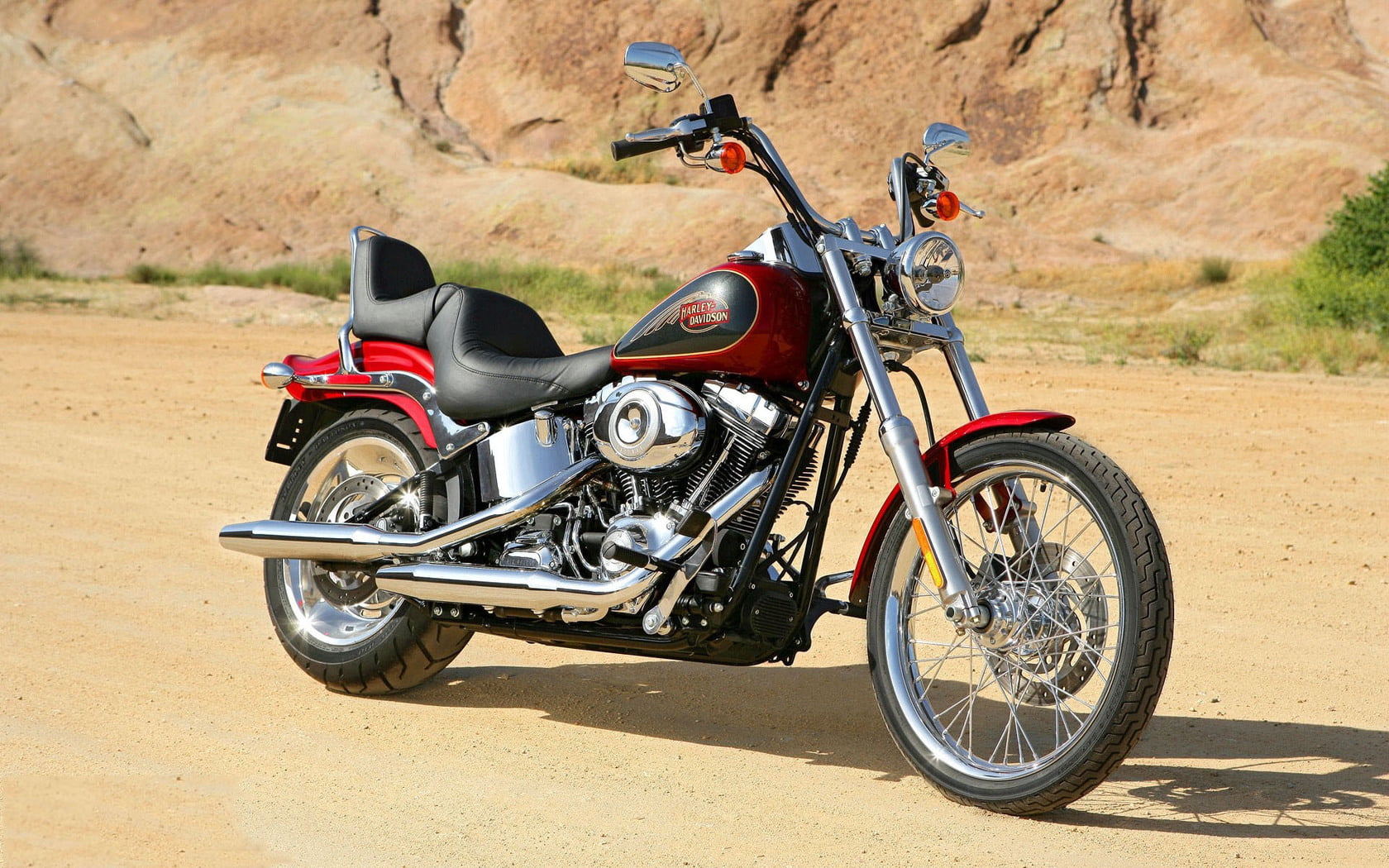 Harley Davidson FXSTC Softail Custom, red and black cruiser motorcycle