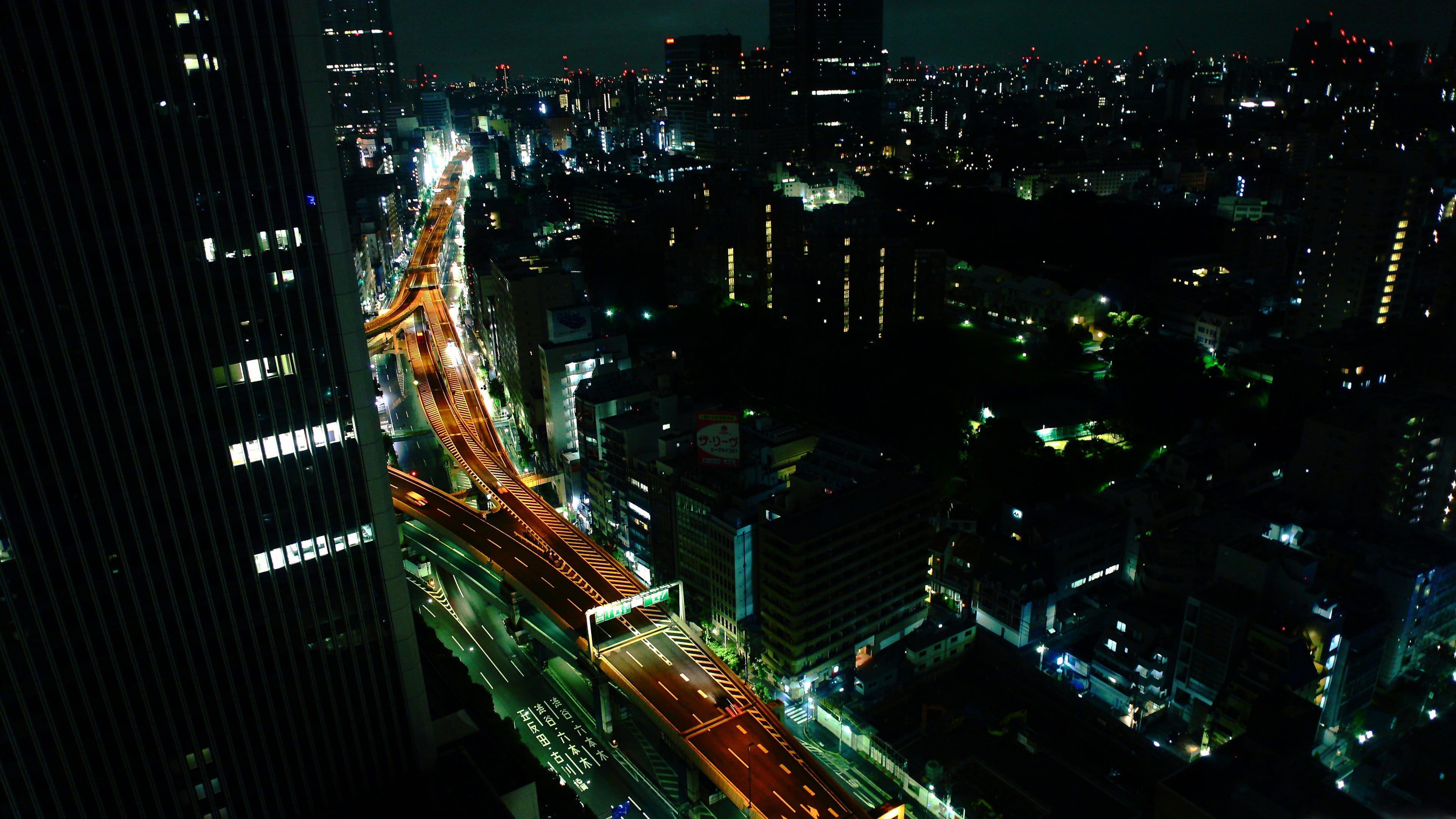 grey high rise building, highway, Tokyo, cityscape, night, skyscraper