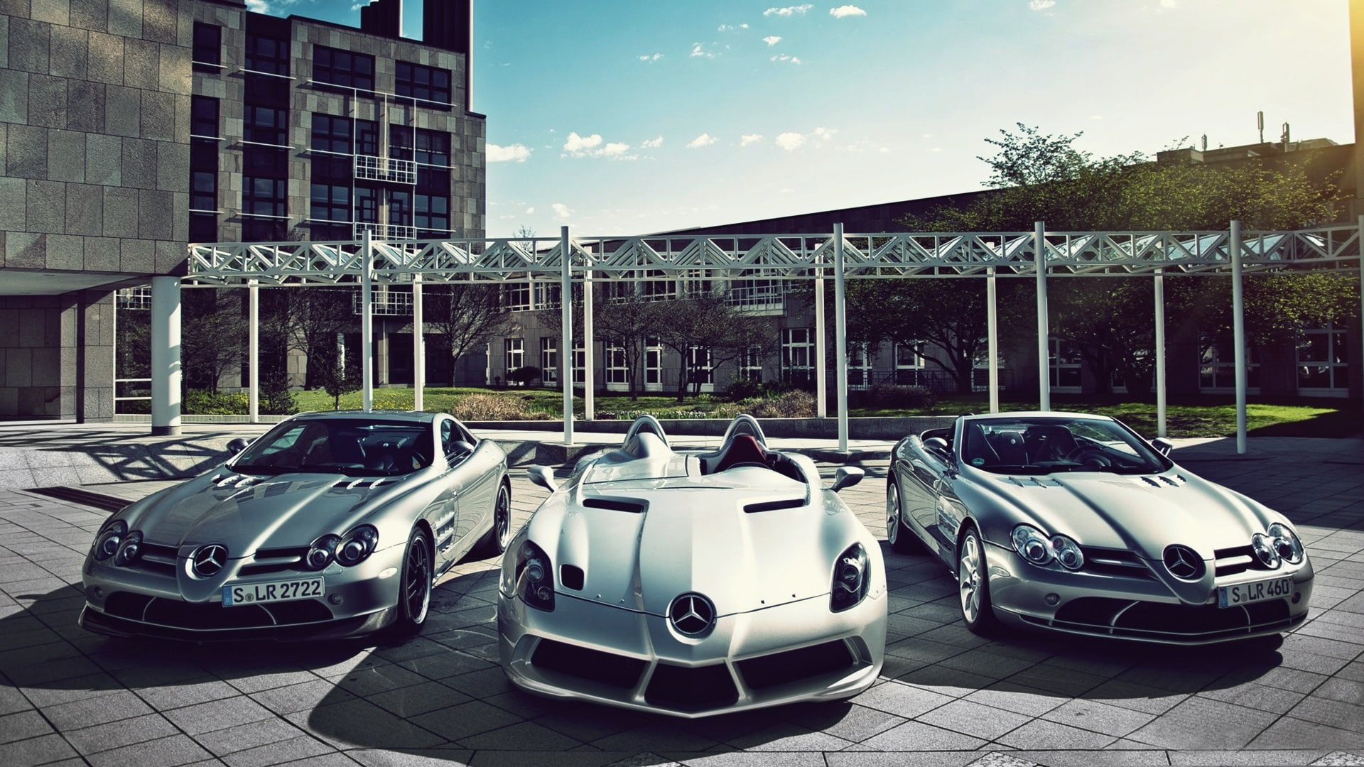 Three sports cars, Mercedes-Benz cars, three silver mercedes benz
