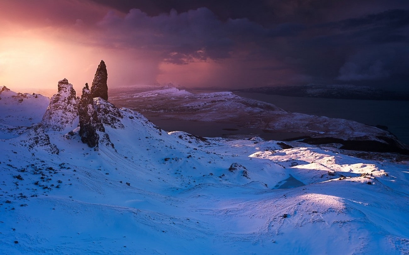 nature landscape winter sunrise old man of storr snow clouds sea island summit scotland