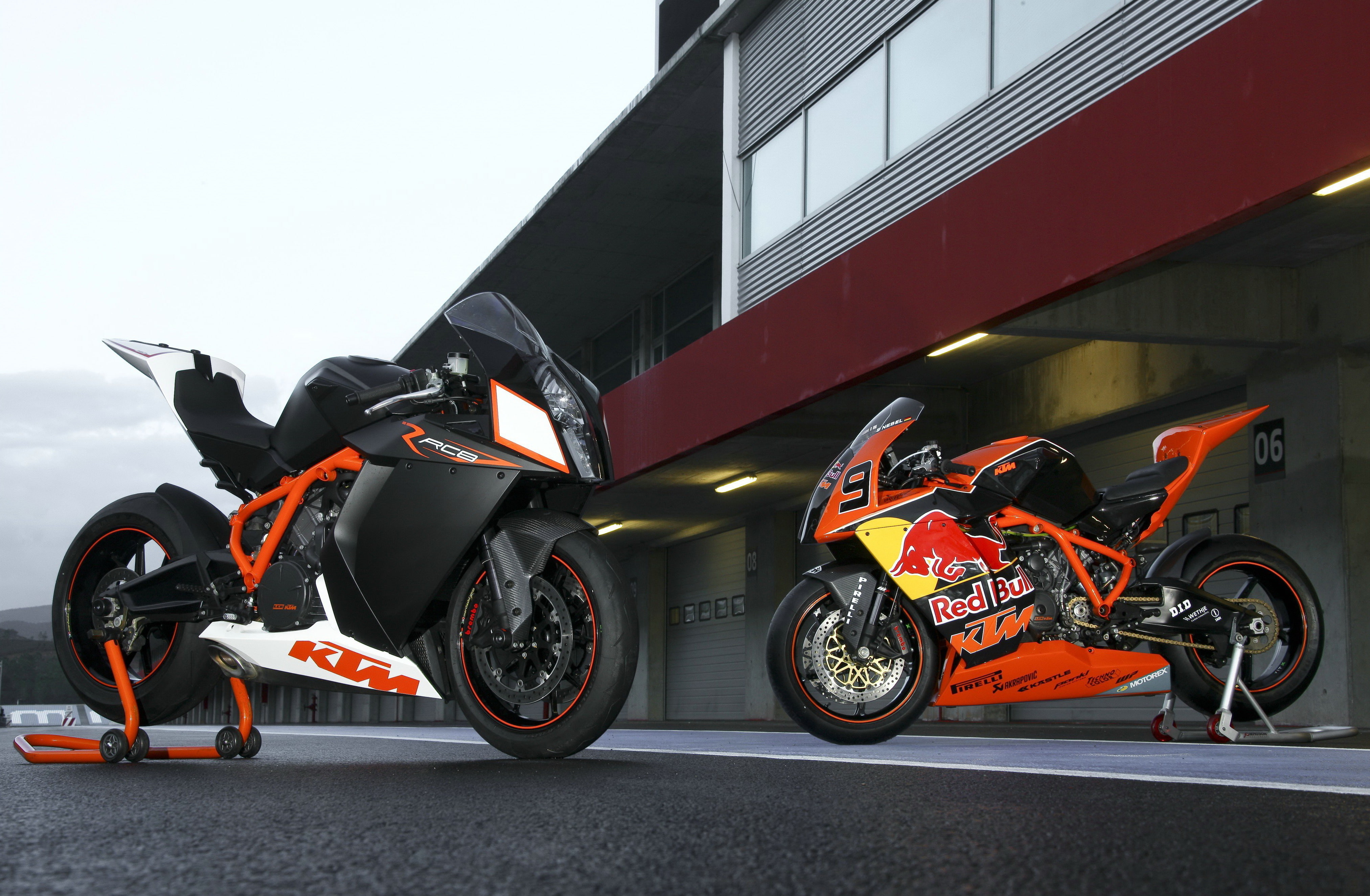 two black and orange KTM sports bikes, motorcycle, red bull, rc8