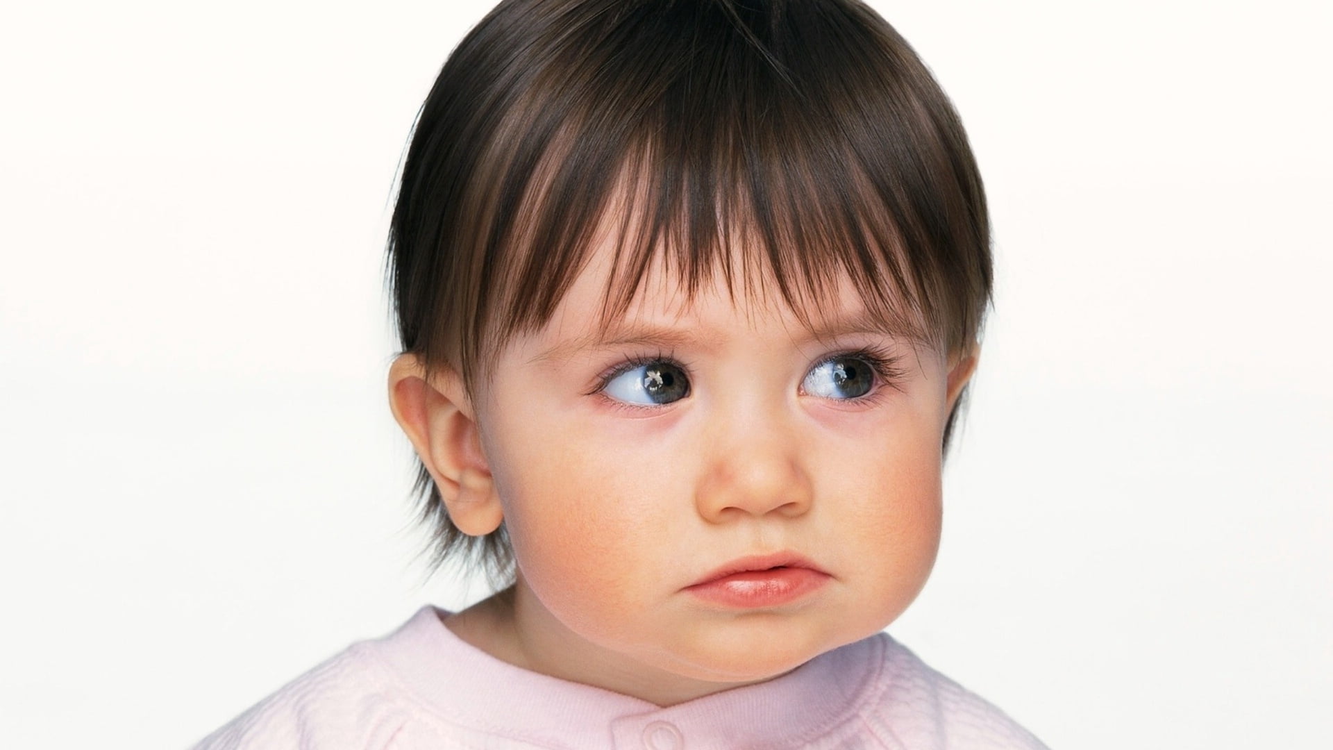 baby's pink top, child, face, eyes, grimace, discontent, cute