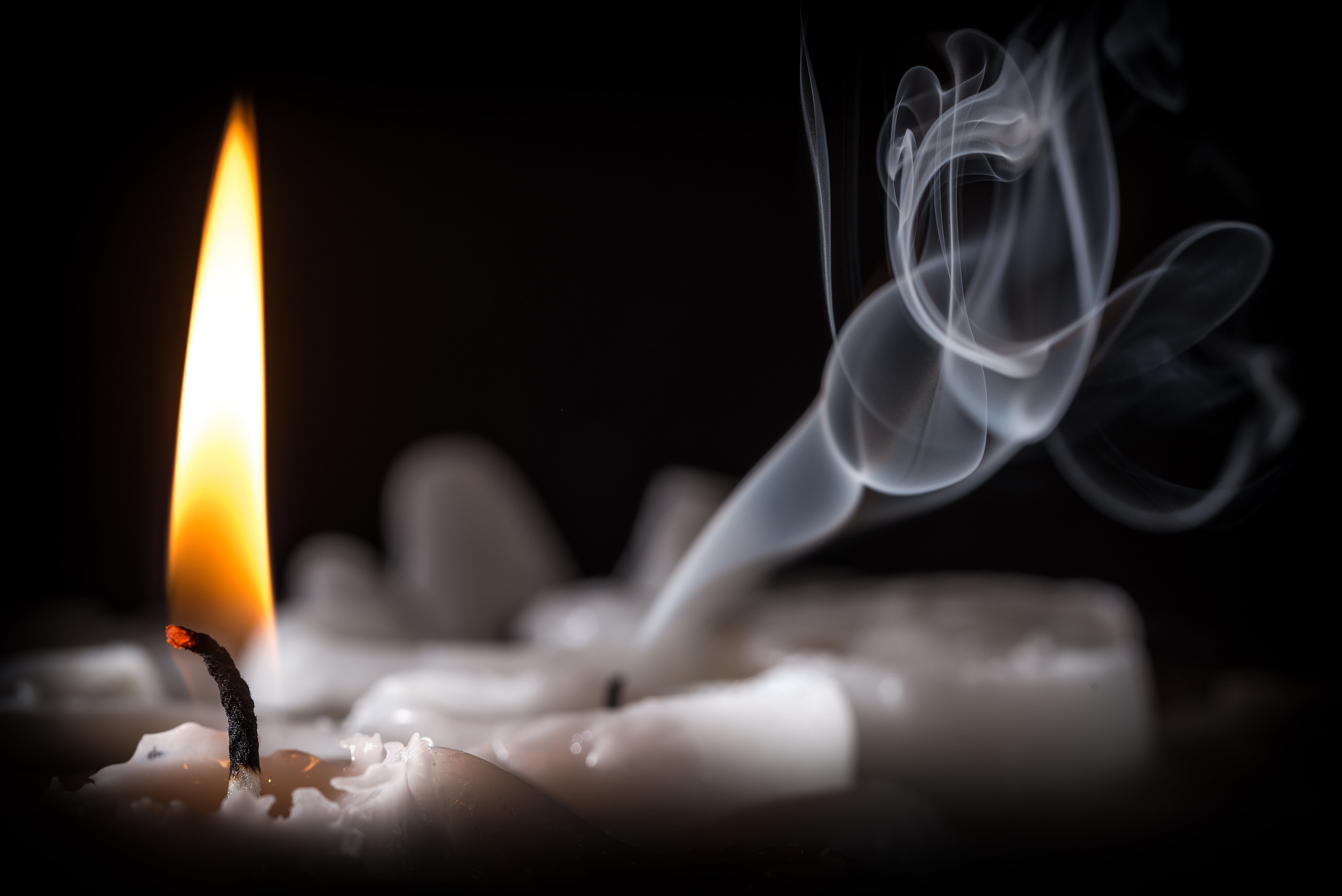 close up photo of lighted candle, dark  black, background, fire - Natural Phenomenon