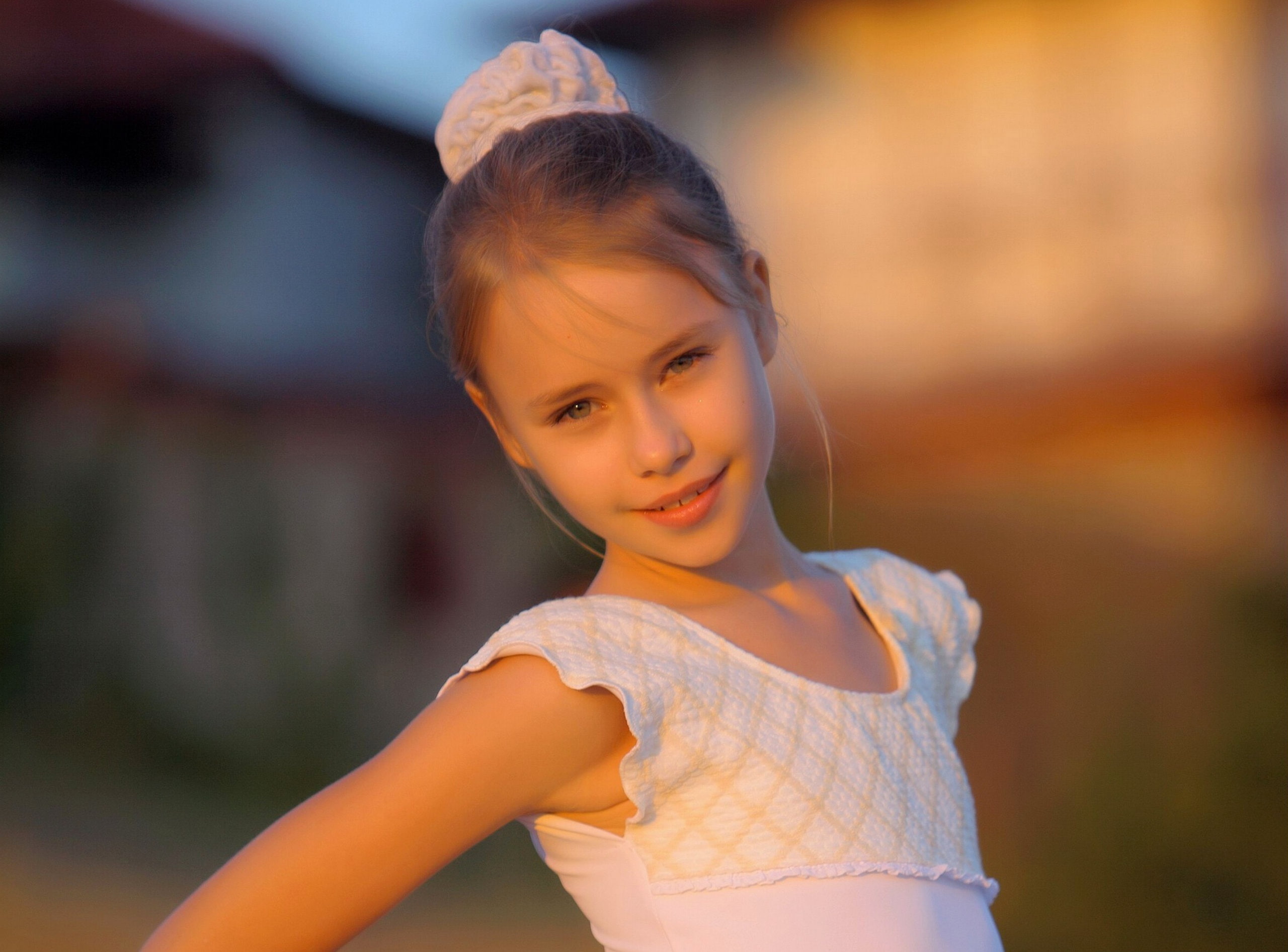 Hanna Portrait at Sunset, girl's white and pink sleeveless top