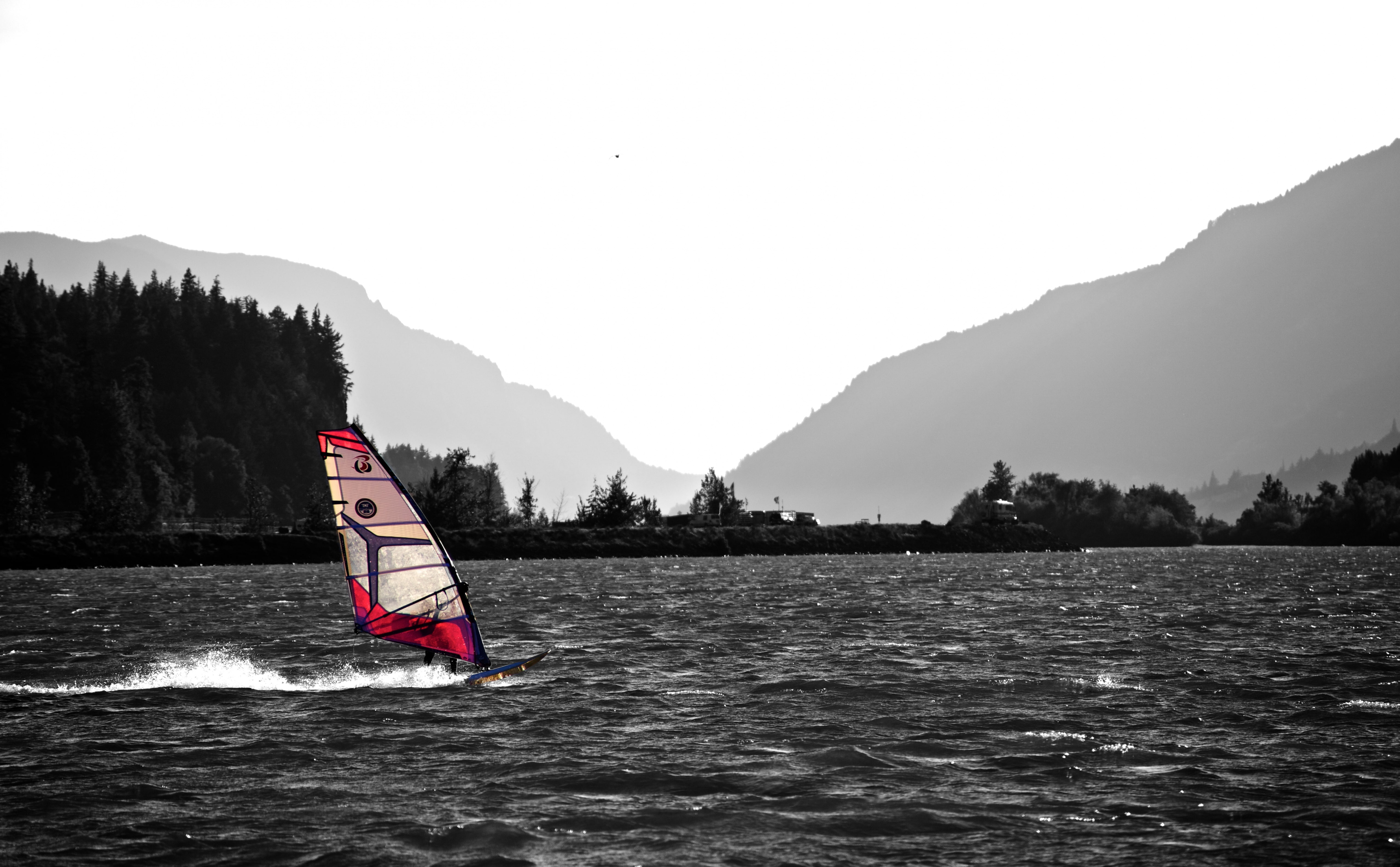 Windsurfing In The Columbia River Gorge, white and red sailboat