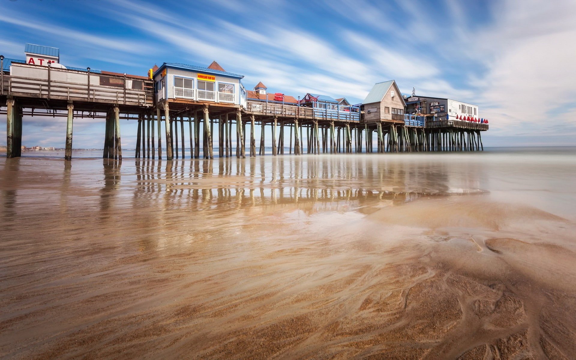 old orchard beach maine usa pier reflection beach sand low tide