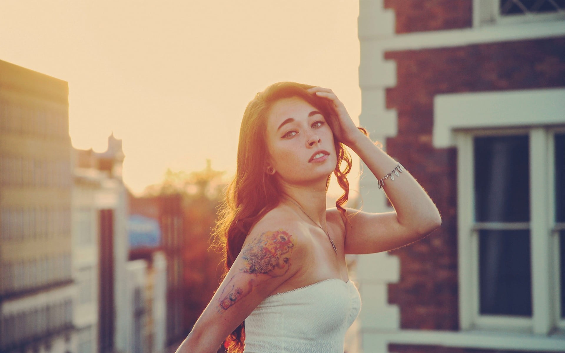 women's white tube top, tattoo, Melinda Sanders, sunlight, bracelets
