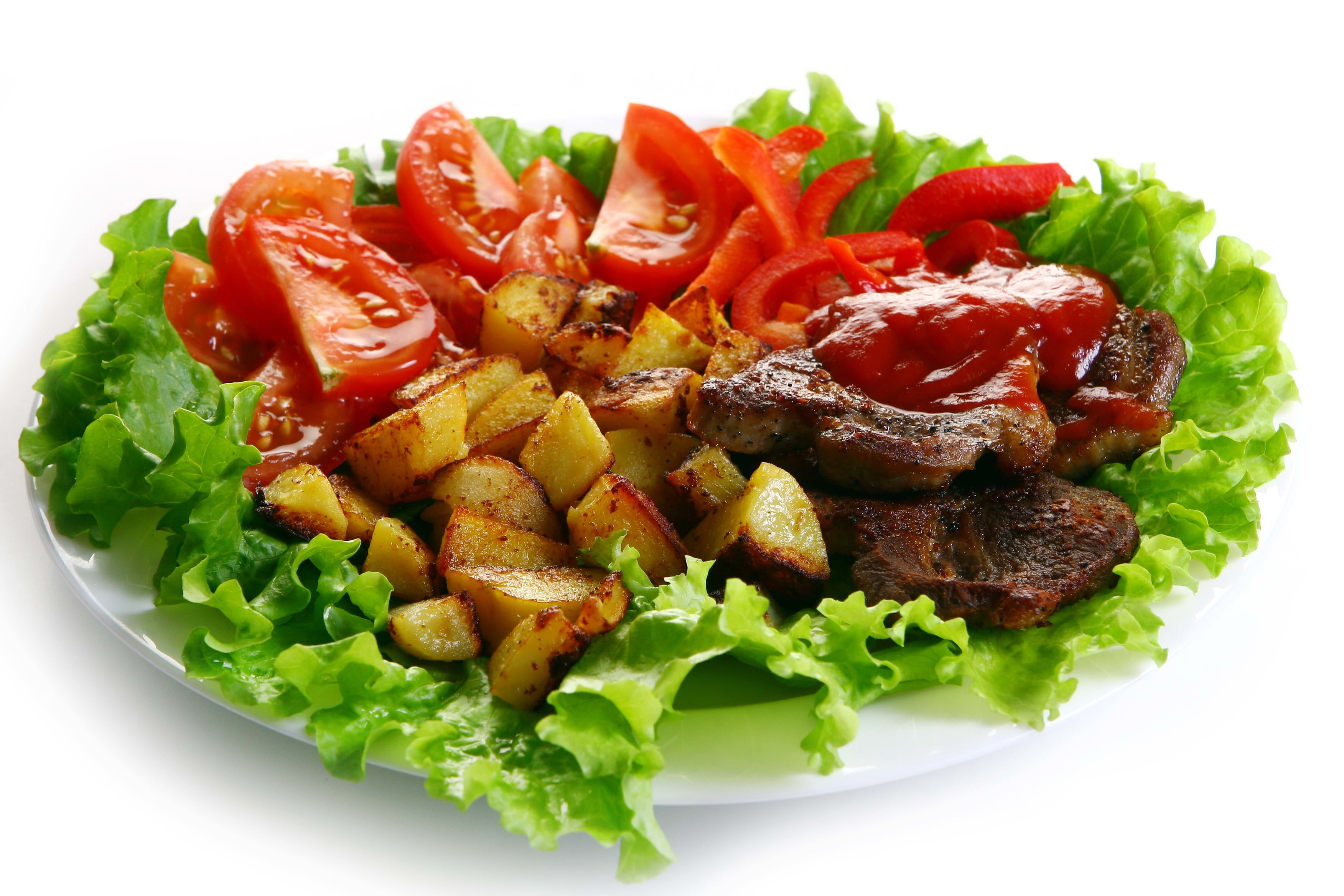 meat dish, ketchup, potatoes, tomatoes, lettuce, plate, cabbage