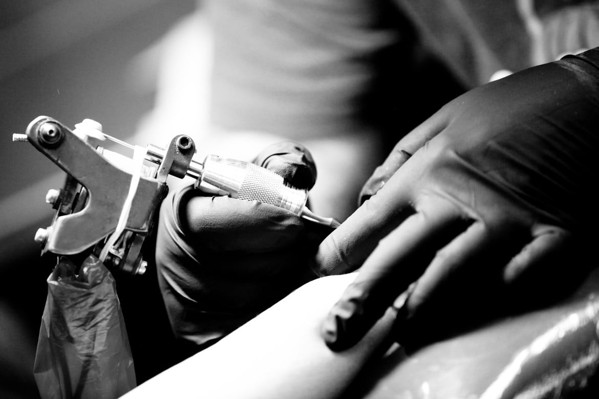 grayscale photography of tattoo machine, monochrome, music, one person