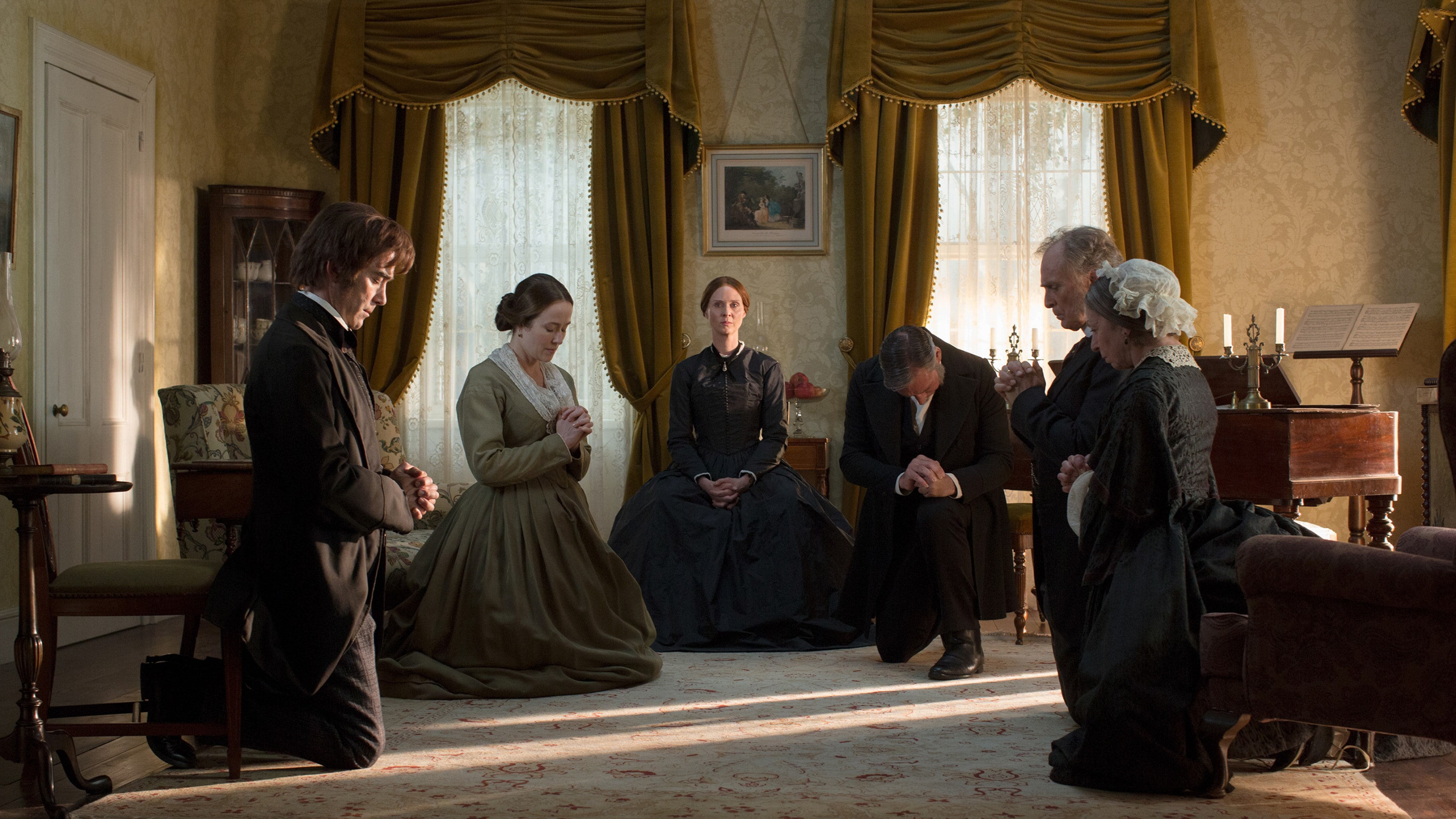 group of people kneeling praying inside room movie scene, A Quiet Passion