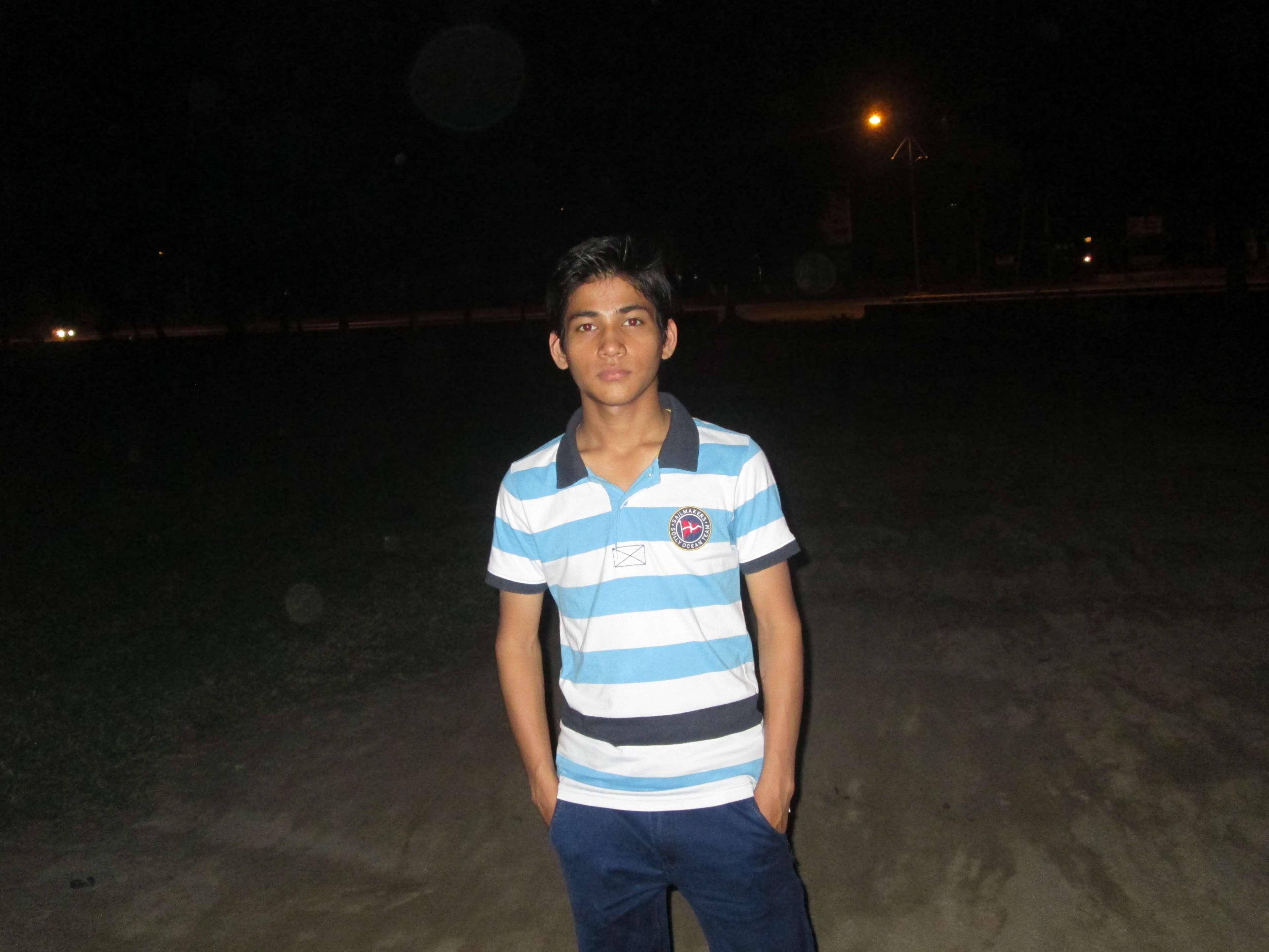 boy, indian, raj, looking at camera, standing, night, front view