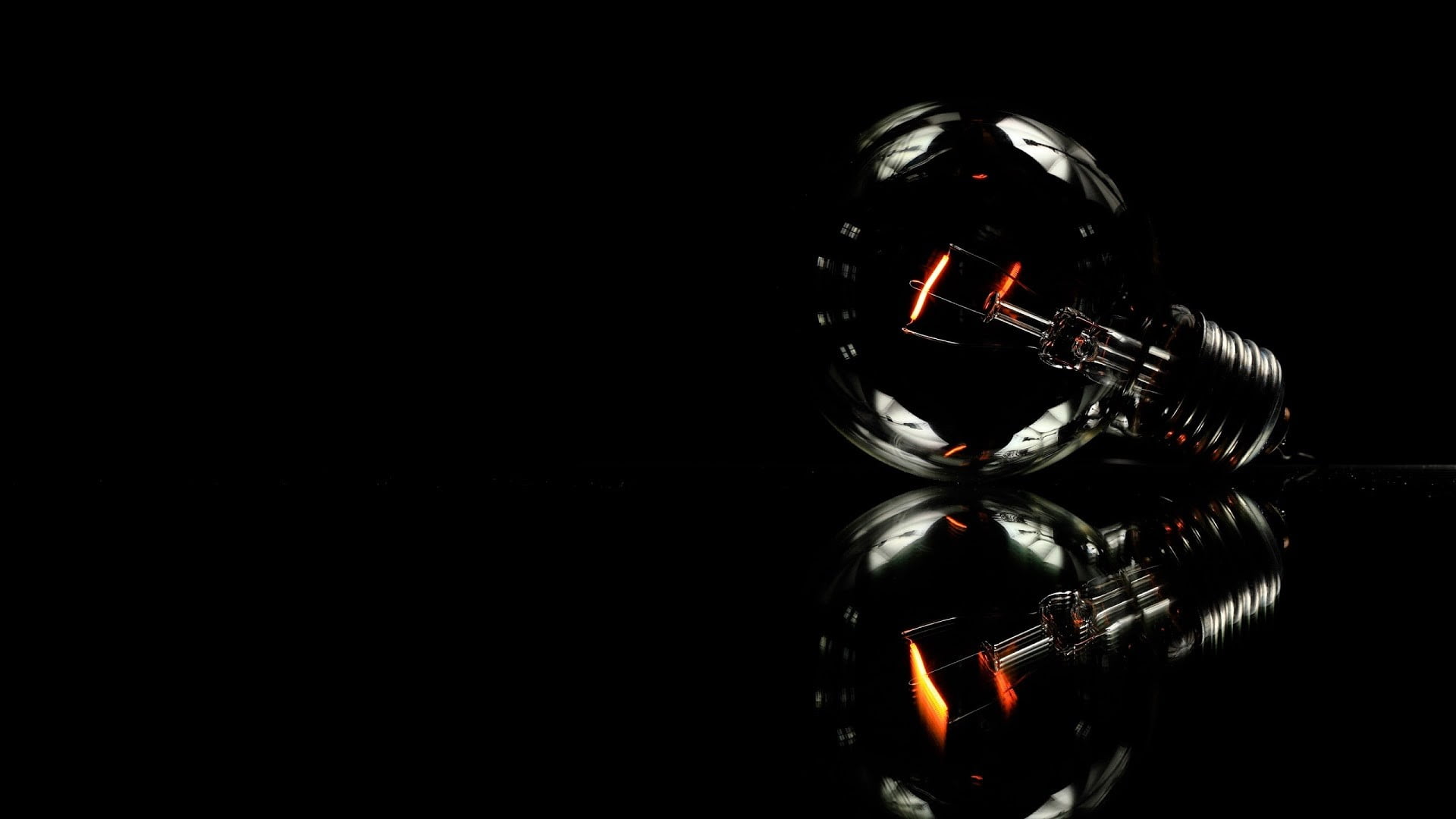 light bulb, black, black background, studio shot, copy space