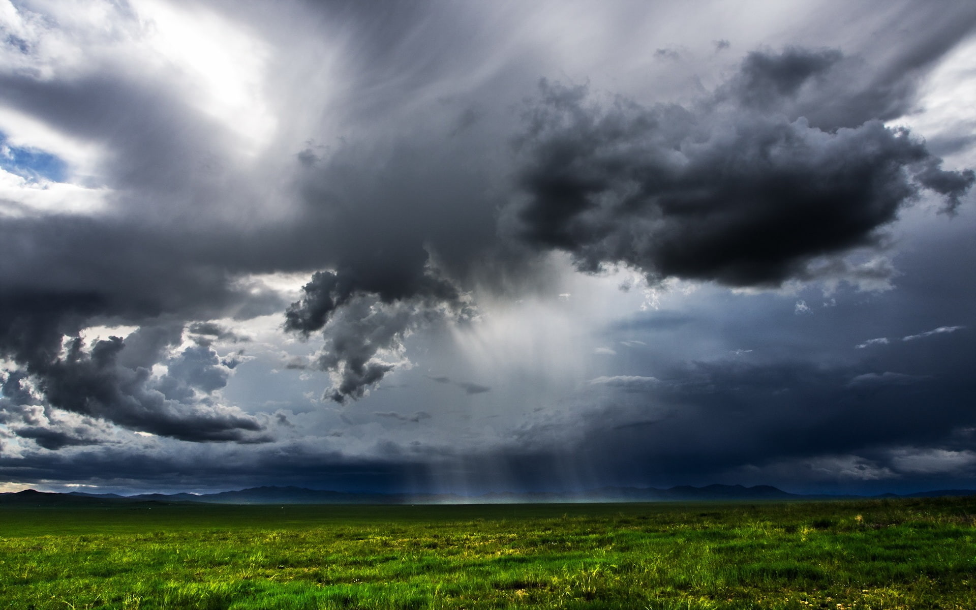 Mongolia, green fields, dark clouds, rain, nimbus clouds