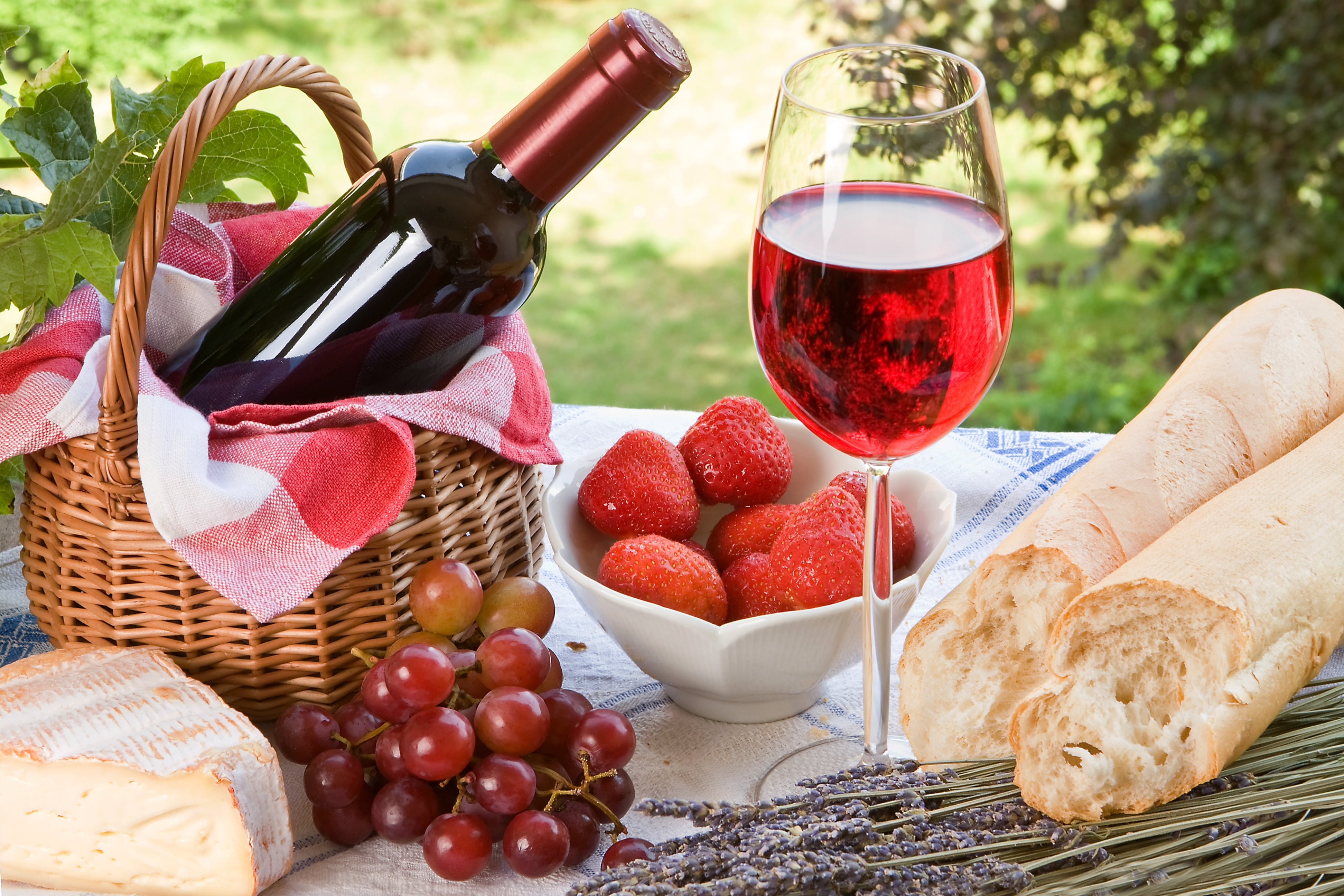 clear wine glass and grape fruits, berries, red, basket, bottle