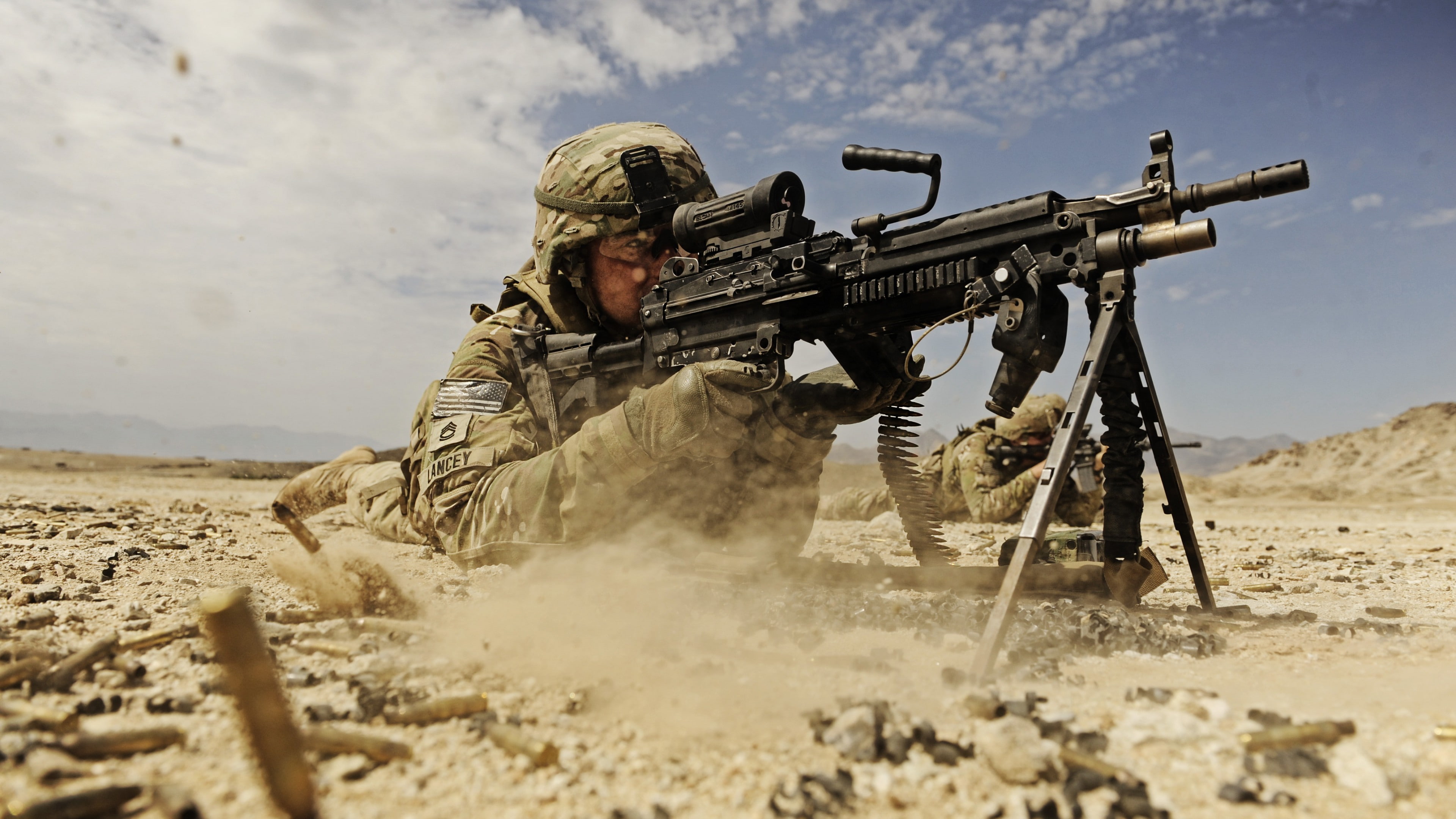 soldier, M249 LMG machine gun U.S. Army, firing, dust, sand