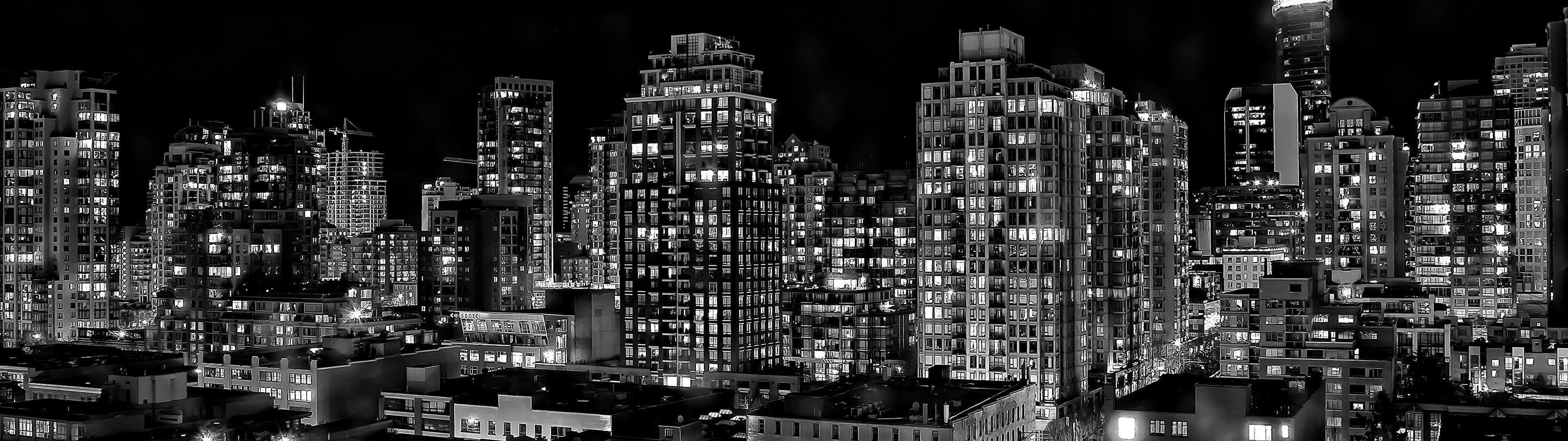 grayscale photo of high rise building, skyline, cityscape, night